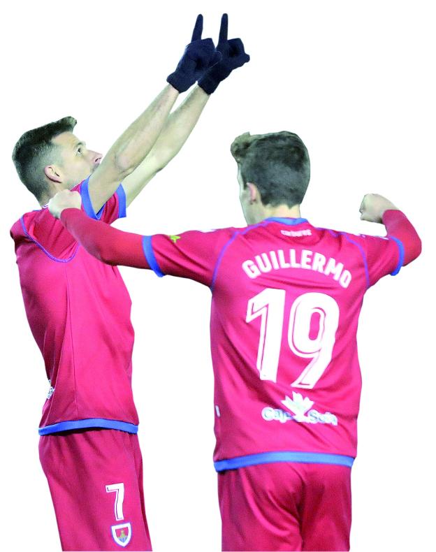 Guillermo y Manu del Moral celebran un gol del Numancia, próximo rival./EL NORTE DE CASTILLA