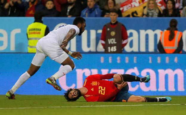 Isco, tras lesionarse en el partido ante Costa Rica./Reuters